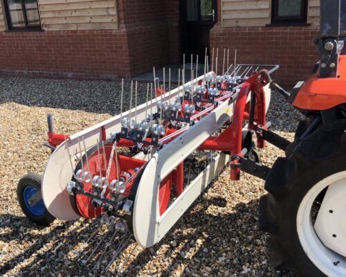 Hay turning spreading machine