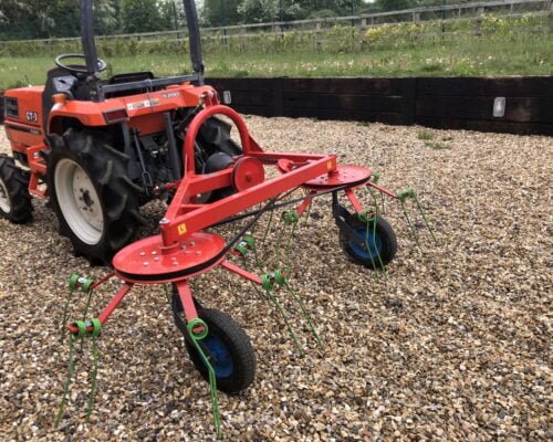 Hay turning spreading machine